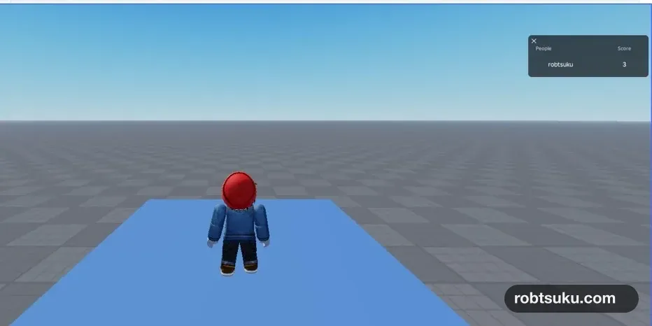 A Roblox playtest after all three coins were collected and Score reached 3